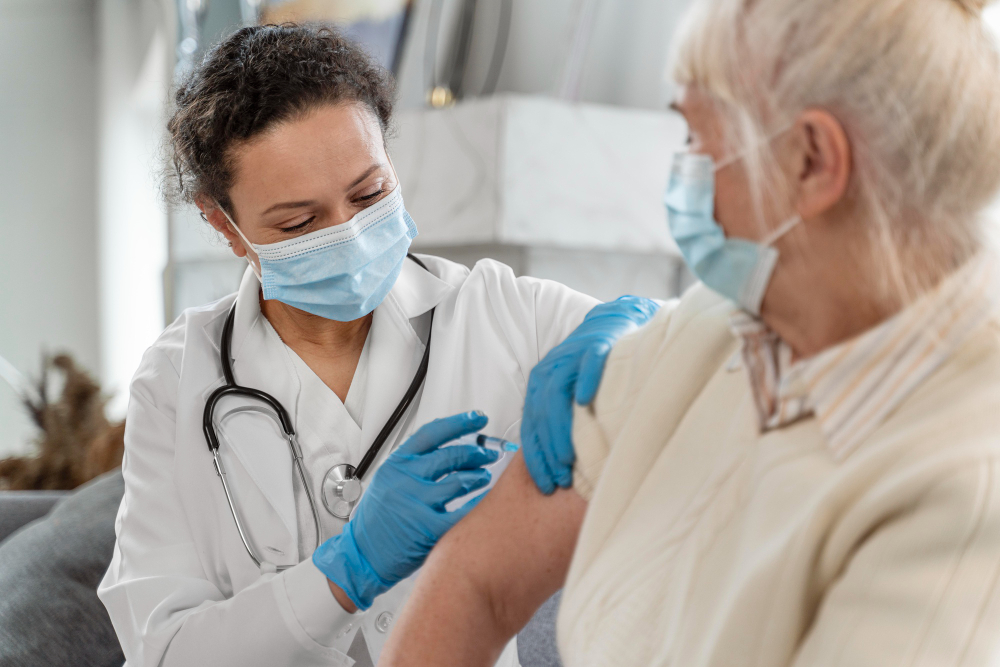 Flu shot being administered at Viva Health Centre for flu prevention and seasonal health care.